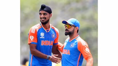 Virat Kohli and Arshdeep Singh (Photo: ANI)