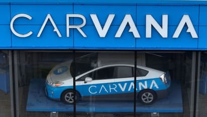 https://stocktwits.com/news-articles/markets/equity/carvana-stock-drops-on-soft-q3-profit-rising-subprime-auto-loans-exacerbate-concerns/cLGF1PrR3D0