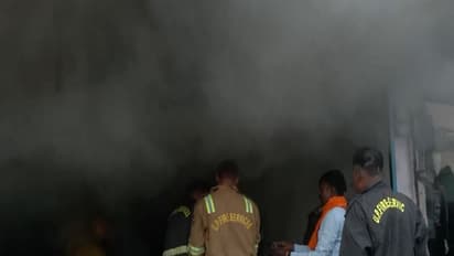 Firefighters controlling the blaze at the garments shop in Gorakhpur (Photo/ANI)