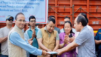 Officials from the Indian Embassy hand over the first consignment of a 70-metre Bailey bridge to Nepal authorities to restore flood-hit road connectivity (Photo/@navsri6619)