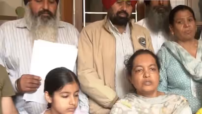 Family members of deceased PWC official Gagandeep Singh Randhawa demand justice in Amritsar (Photo/ANI)