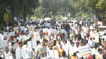 Delhi BJP workers protesting outside AAP headquarters (Photo/ANI)