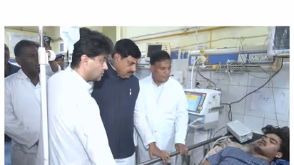 MP CM Mohan Yadav and Union Minister Jyotiraditya Scindia meeting the injured person (Photo/ANI)