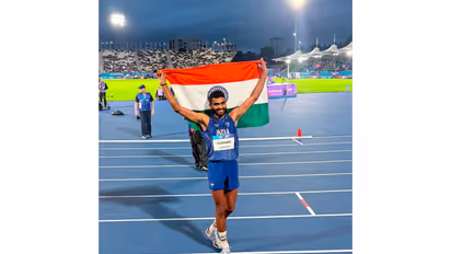 Sarvesh Kushare celebrating with Indian flag. (Photo: X/@KirenRijiju)