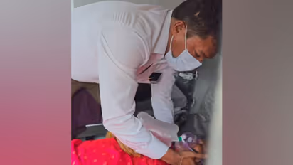 A doctor attends to an injured person (Photo/ANI)