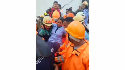 Rescue personal after a building collapsed in Pimpri chinchwad. (Photo/ANI)