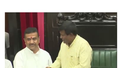 CM adhikari and newly elected Speaker Rathindra Bose (Photo/West Bengal Assembly)
