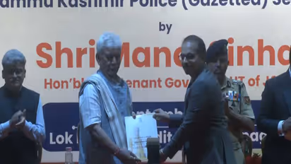 Jammu and Kashmir Lieutenant Governor Manoj Sinha handing appointment orders(Photo/ANI)