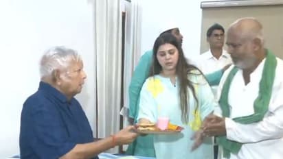 RJD workers extend their wishes to RJD chief Lalu Prasad Yadav on his birthday. (Photo/ANI)