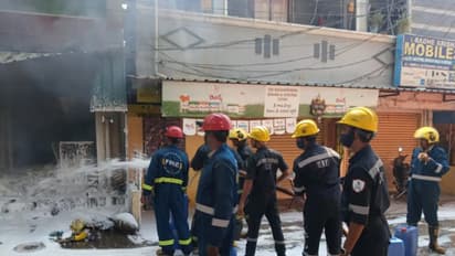 Fire fighters dosuing the flames at the scrap godowan (Photo/Fire officials)