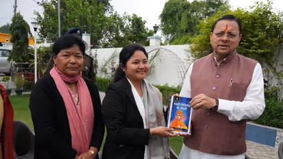 CM Pushkar Singh Dhami met with candidates who cleared the UPSC exam (Photo/ANI)