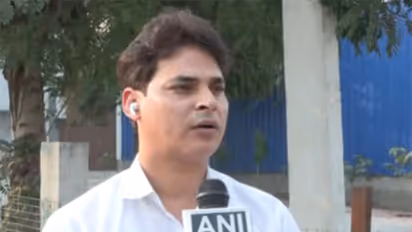 Amit Patel, dealer at Royal Car Zone - a second-hand car dealership in Faridabad (Photo/ANI)