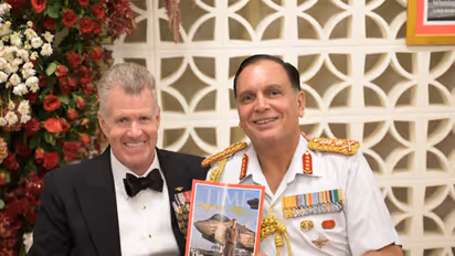 USPACOM Commander Admiral Samuel Paparo and Chief of Defence Staff General N. S. Raja Subramani holding a copy of TIME magazine featuring Admiral Paparo on the cover. (Photo: X/@USAndIndia)