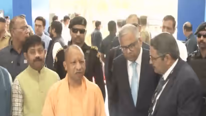 UP CM Yogi Adityanath and Tata Sons Chairman N Chandrasekaran at the roll out of the 10 lakhth vehicle (Photo/ANI)