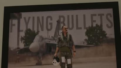 Wing Commander Naman Syal's photo in a frame at his native village Patiyalkar in Kangra (Photo/ANI)