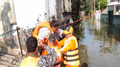 NDRF personnel assist residents during flood rescue efforts in Sri Lanka. (Photo: X/@IndiainSL)