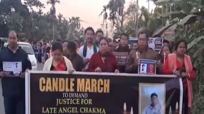 People hold candle march in Agartala (Photo: ANI)