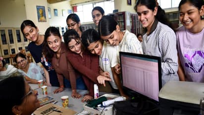 Students check their results after CBSE announcement (Photo/ANI)
