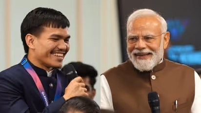 Jadumani Singh (L) and Narendra Modi (R) (Photo: ANI/DD)