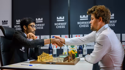 Rameshbabu Praggnanandhaa (L) during a Norway Chess game against Magnus Carlsen. (Photo: X/@rpraggnachess)