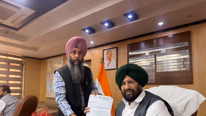 Hardev Singh Ubha, Senior Leader, BJP Punjab, with Harjit Singh Grewal, Chairman, National Commission for Minorities, at the Commission’s office in New Delhi. (Photo/ANI)
