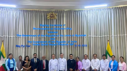 India's Ambassador to Myanmar Abhay Thakur and Myanmar's Union Minister for National Planning, Investment and Foreign Economic Relations U Aung Kyaw Hoe with officials during the signing ceremony of MoUs on five Quick Impact Projects in Naypyitaw. (Photo: X/@IndiainMyanmar)