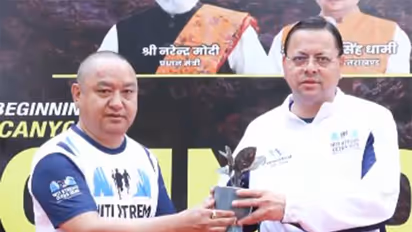 Uttarakhand CM Pushkar Singh Dhami (right) flags off ‘Niti Xtreme Ultra Countdown Run’ (Photo: X/ @ANI)