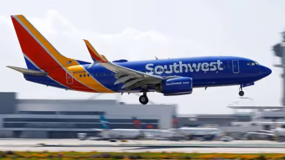 https://stocktwits.com/news-articles/markets/equity/southwest-airlines-cuts-2025-profit-outlook-after-delta/cLIS2vpREkb