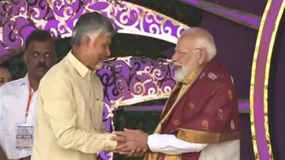 Andhra Pradesh CM N Chandrababu Naidu with PM Modi  in Puttaparthi (Photo/ANI)