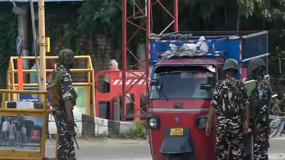 Security personnel deployed at a checkpoint in Srinagar (Photo/ANI)