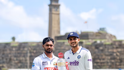 Sri Lanka captain Dhananjaya de Silva (L) with Shubman Gill in Galle. (Photo: ANI)