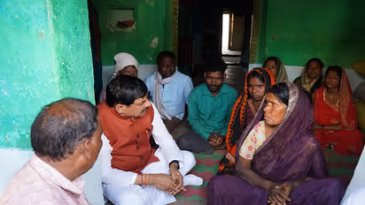 MP CM Mohan Yadav with affected family members of the accident (Photo/ X @DrMohanYadav51)