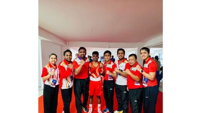 Vishvanath Suresh with his support staff in Ulaanbaatar. (Photo/Asian Boxing)