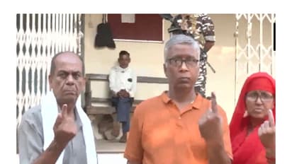 Voters show their inked finger after exercising their right (Photo/ANI)