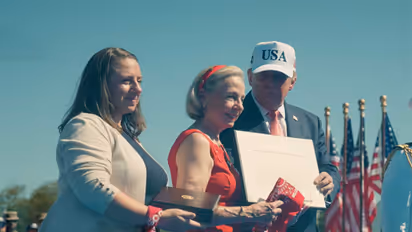 US President Donald Trump posthumously awards the Presidential Medal of Freedom to 9/11 hero Welles Crowther, accepted by his mother, Alison, and his sister, Paige (Photo/Youtube/The White House)