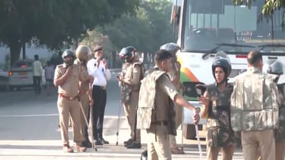 Visual from the workers protest in Noida Phase 2 (Photo/ANI)