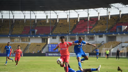Dempo SC and Aizawl FC players in action (Photo: AIFF Media)