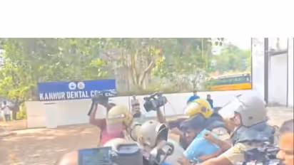 KSU activists being forcibly removed by police from Anjarakandy dental college in Kannur, Keralam on April 13, 2026 (Photo/ANI)