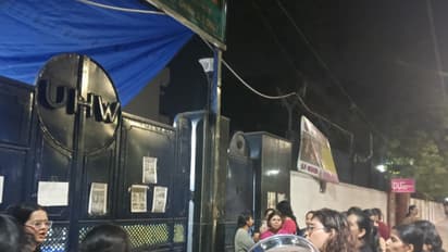 DU hostel women residents stage midnight sit-in protest (Photo/ANI)
