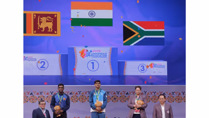 Rishikanta Singh (middle) after clinching Gold at Commonwealth Weightlifting Championship 2025 in Ahmedabad (Photo: X/@Media_SAI)