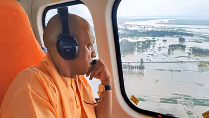 CM Yogi conducts an aerial survey of flood-hit areas in Farrukhabad on Thursday (Photo: ANI)