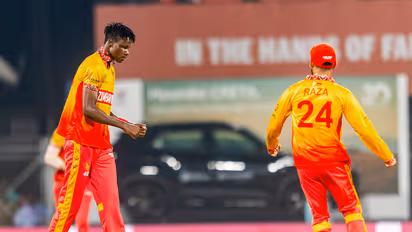 Zimbabwe's Blessing Muzarabani and skipper Sikandar Raza. (Photo: ANI)
