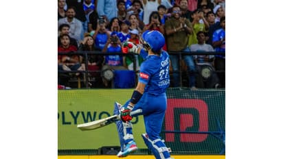 Rahmanullah Gurbaz celebrating his century. (Photo: ANI)