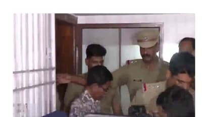 TG Mohandas being taken into custody (Photo/ANI)