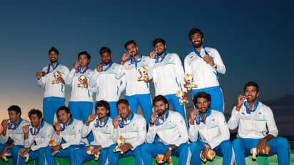 Team India celebrates with the men's cricket gold medal at the 2026 Asian Games (Photo: X/@BCCI)