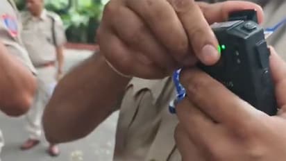 Delhi Police personnel use body cameras on their uniform (Photo/ANI)