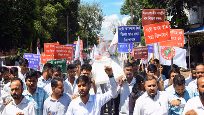 The All Assam Students’ Union (AASU) staged a protest in Dibrugarh on Thursday against the rising prices of essential commodities (Photo/ ANI)