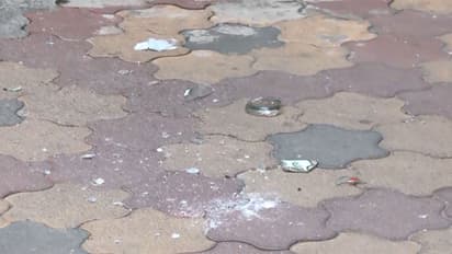 Pieces of bottles found inside the RSS office premises (Photo/ANI)