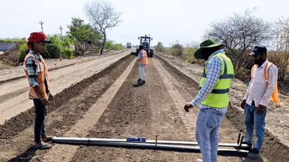 Road development using green technology (Photo/Gujarat CMO)