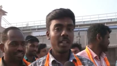 A devotee from  Kashi Tamil Sangamam  (Photo/ANI)